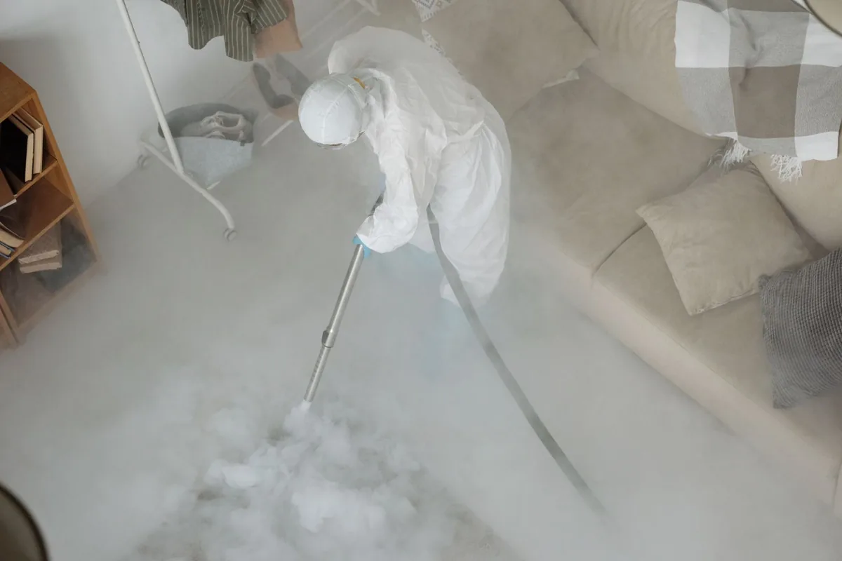 Biohazard cleanup technician in protective equipment, Burnt Store Marina, FL